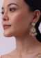 White Layered Kundan Necklace And Earring Set With Carved Motif