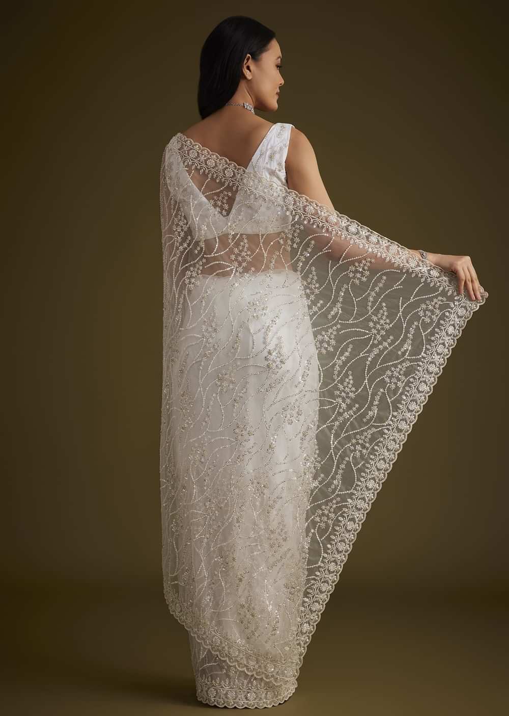 White Net Saree With Sequins And Stones Embroidery