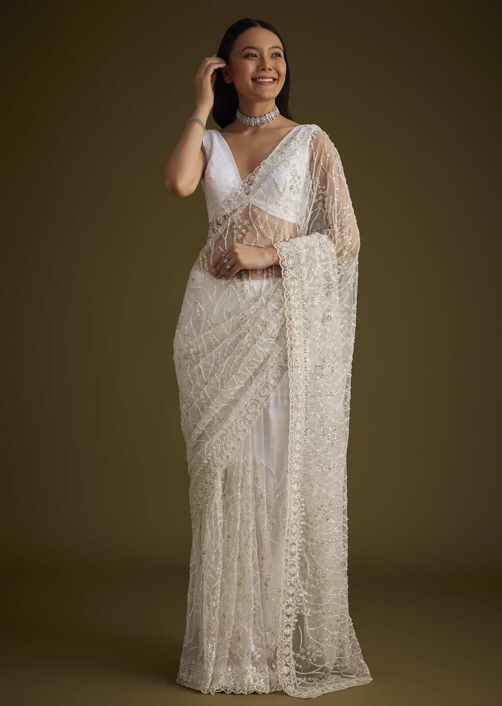 White Net Saree With Sequins And Stones Embroidery