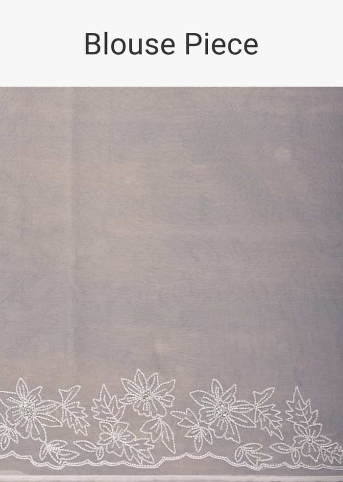 White Organza Saree With Cutdana Work And Unstitched Blouse Piece