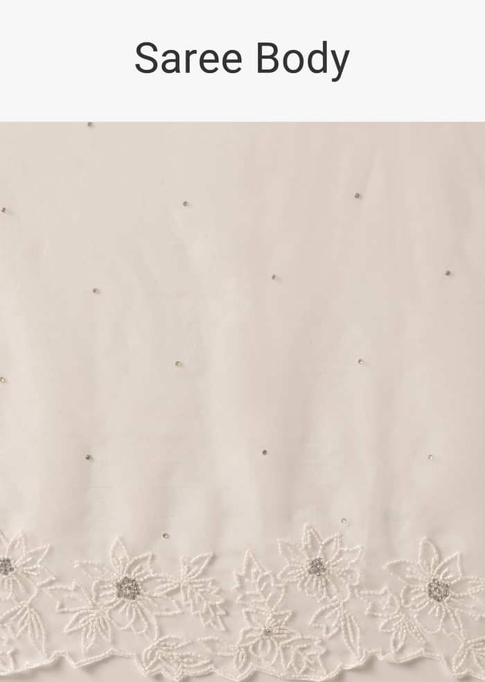 White Organza Saree With Cutdana Work And Unstitched Blouse Piece