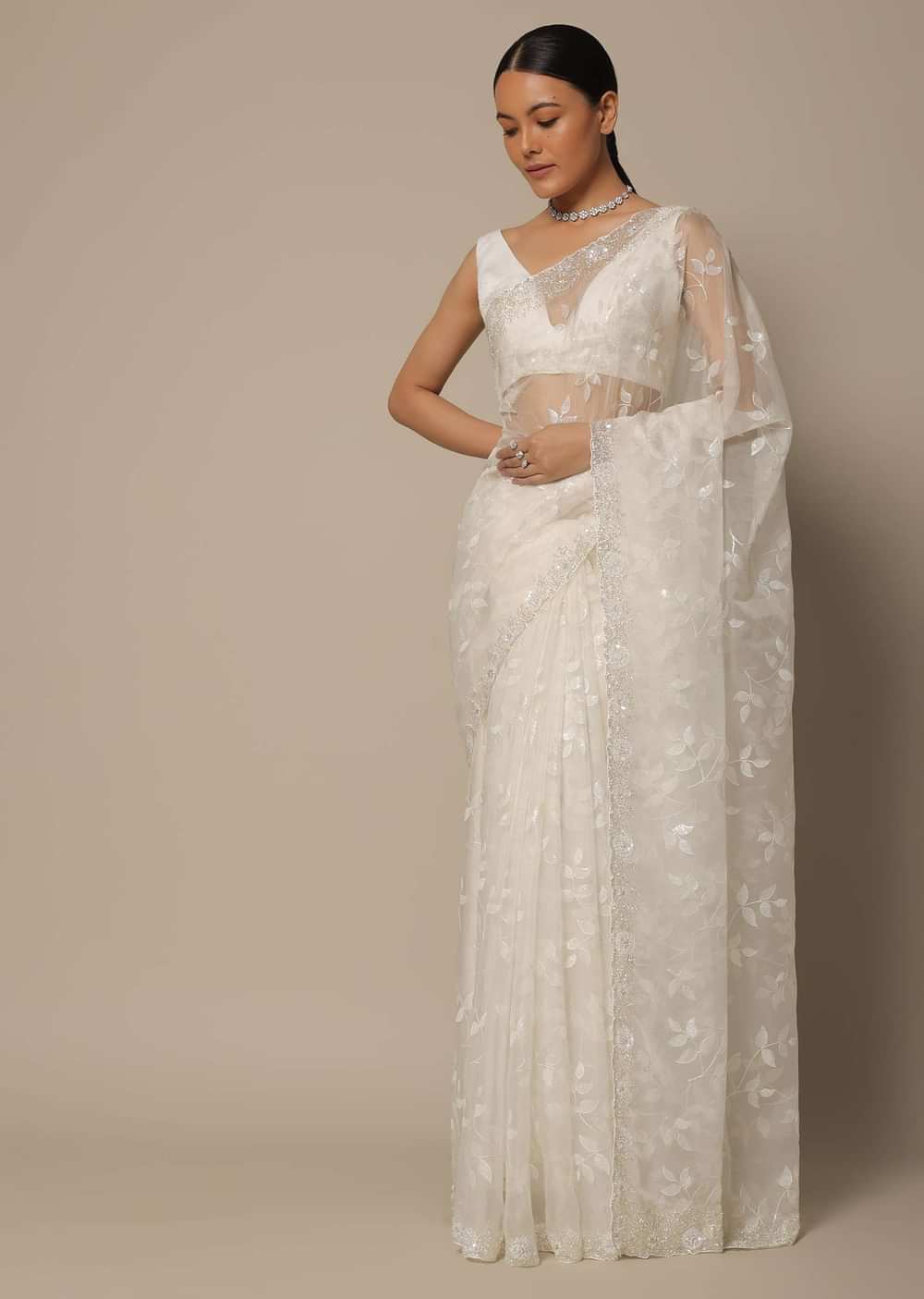 White Organza Saree With Floral Sequin Work And Unstitched Blouse Piece