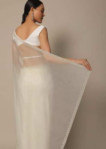 White Organza Saree With Scallop Cutdana Border And Unstitched Blouse Piece