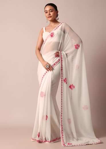 White Saree With Floral Embroidery And Unstitched Blouse Piece