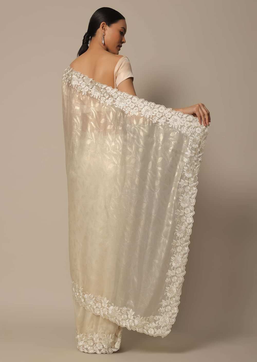 White Satin Saree With Floral Motif Thread Work And Unstitched Blouse Piece