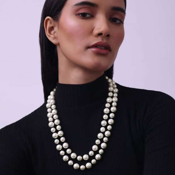 White Toned Mother Of Pearls Mala White Toned Mother Of Pearls Mala
