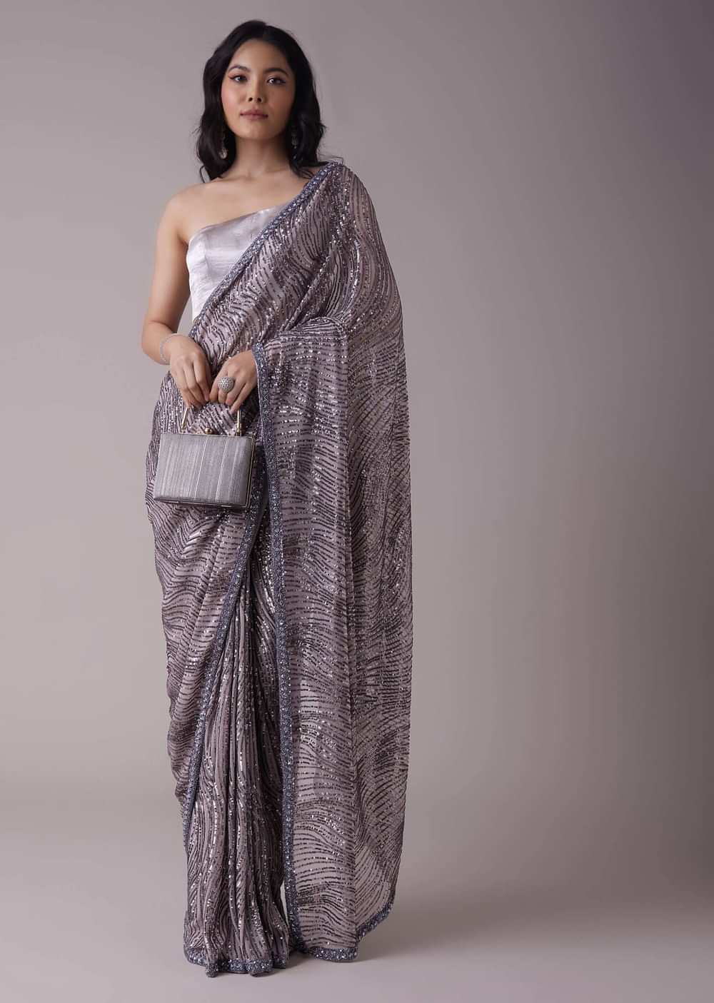 Lavender Purple Sequins Saree With An Embellished Border
