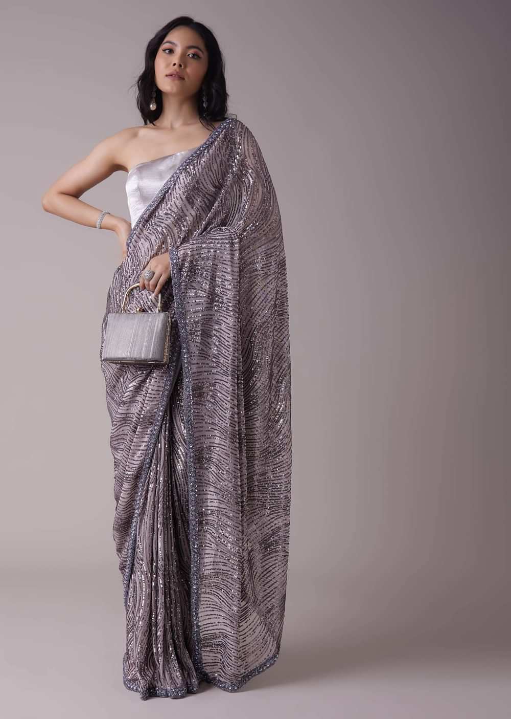 Lavender Purple Sequins Saree With An Embellished Border