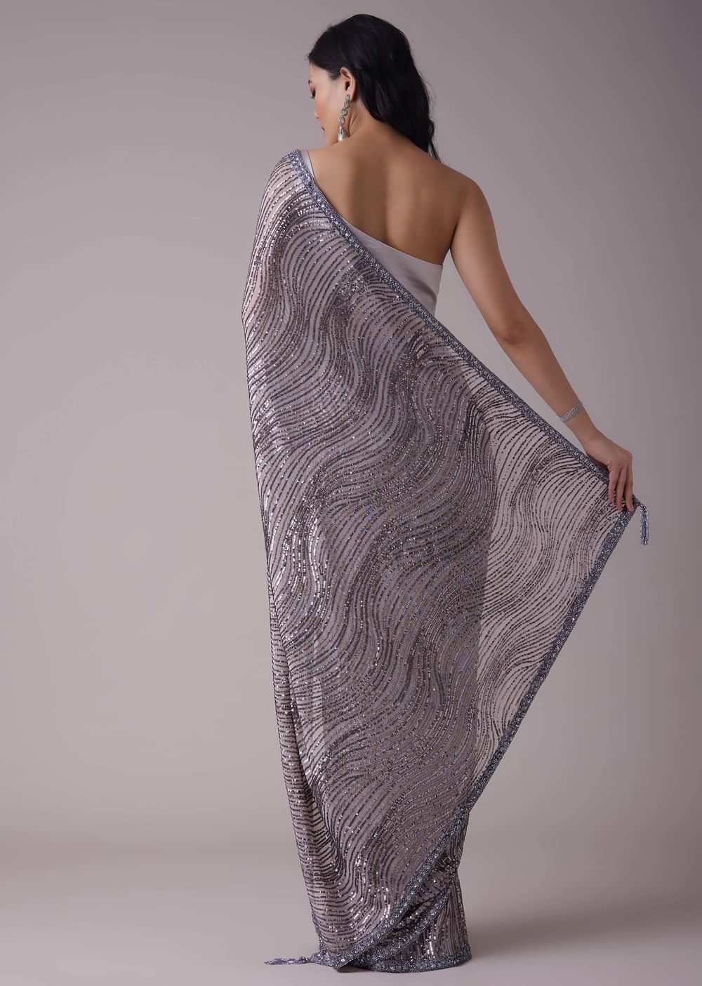 Lavender Purple Sequins Saree With An Embellished Border