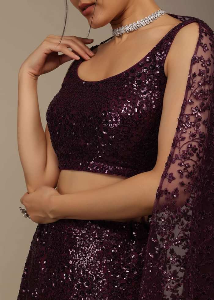 Wine Festive Sequins Embroidered Lehenga Set In Raschel Net Fabric