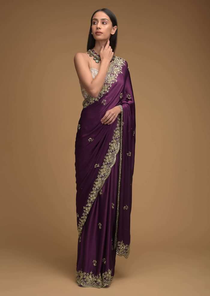 Wine Purple Saree In Satin With Hand Embroidered Scalloped Border And Floral Buttis Along With Unstitched Blouse