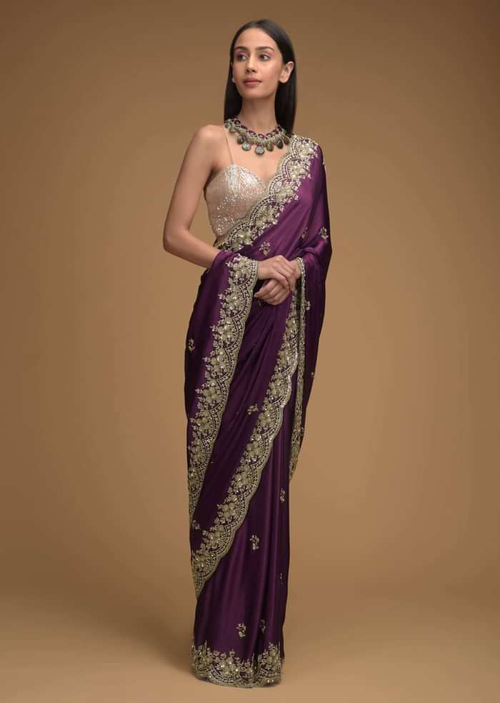 Wine Purple Saree In Satin With Hand Embroidered Scalloped Border And Floral Buttis Along With Unstitched Blouse