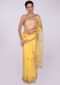 Yellow organza saree with embroidered butti and border only on Kalki