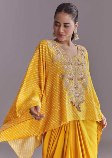 Yellow Silk Kaftan Top And Drape Skirt Set With Leheriya Print