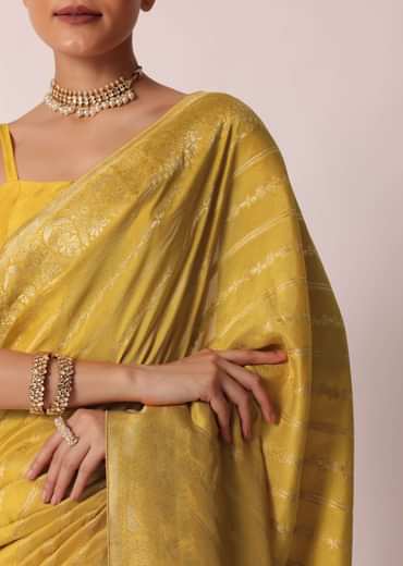 Yellow Banarasi Silk Handloom Saree With Zari Stripes And Unstitched Blouse Piece