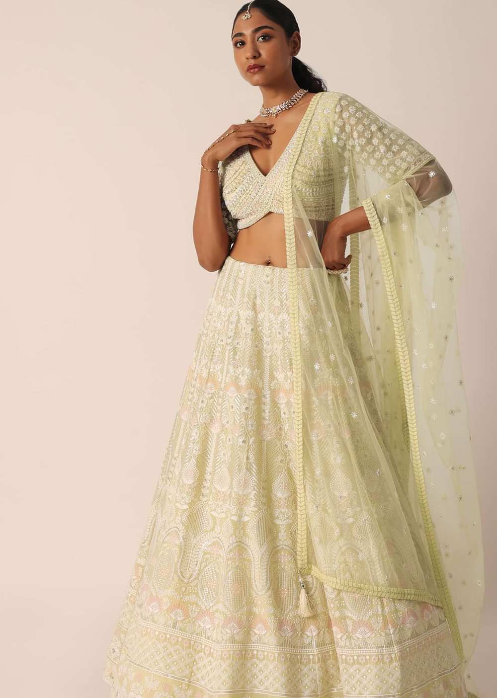 Yellow Net Embroidered Blouse And Skirt Set