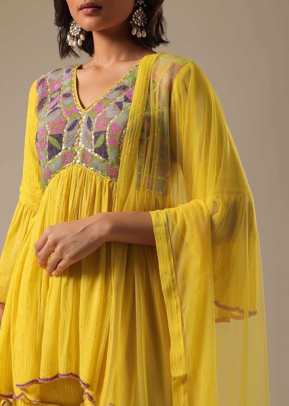 Yellow Sharara Set With Embroidered Peplum Top And Dupatta