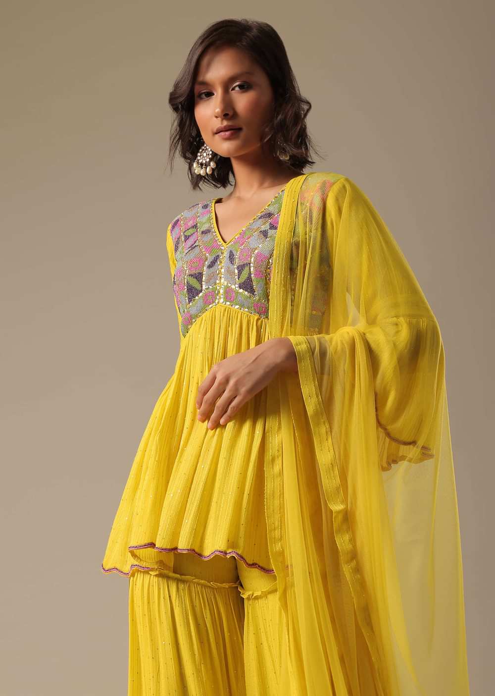 Yellow Sharara Set With Embroidered Peplum Top And Dupatta