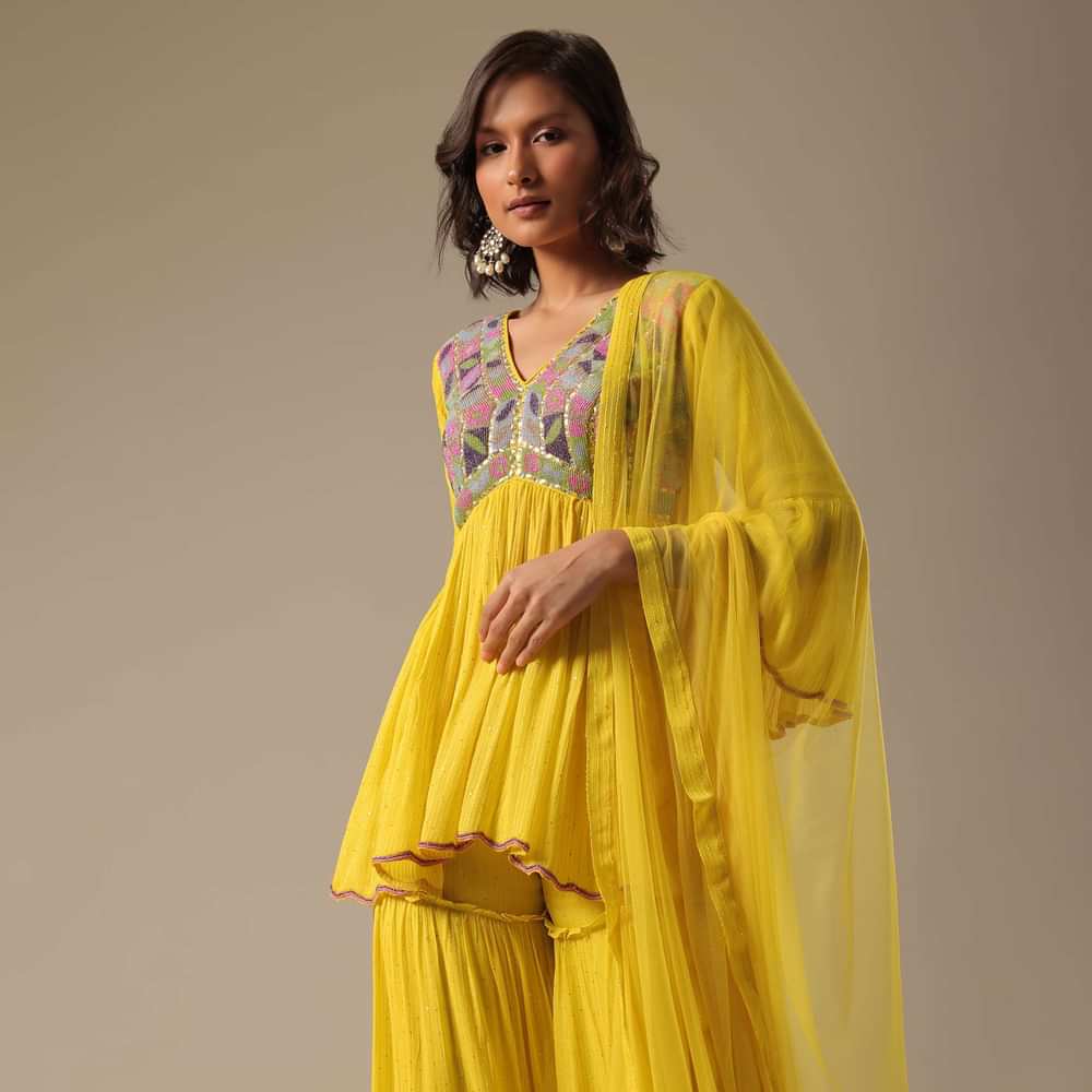Yellow Sharara Set With Embroidered Peplum Top And Dupatta