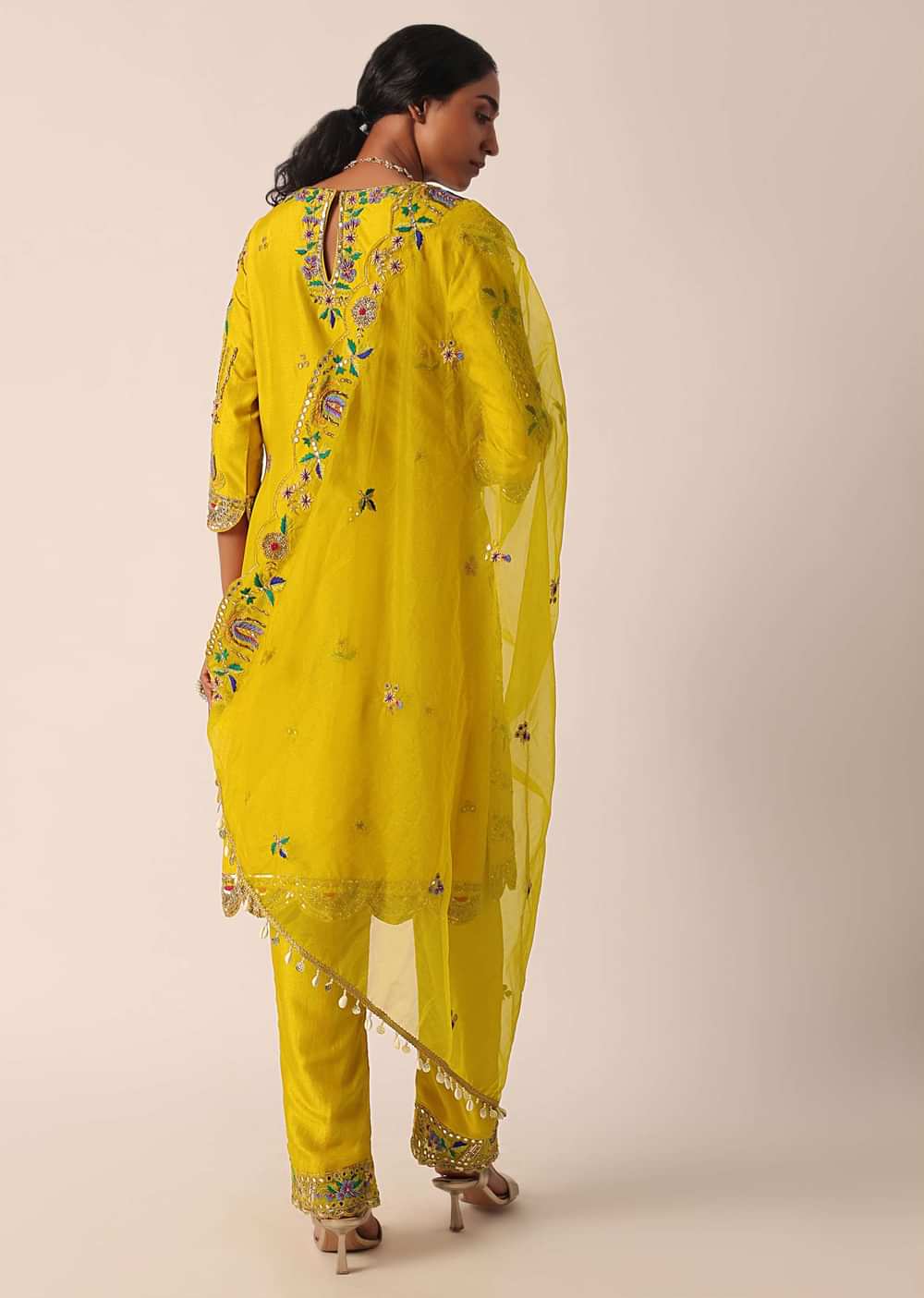 Yellow Silk Kurta Set With Shell Hangings And Mirror Work