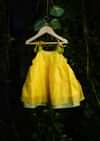 Kalki Girls Yellow Tiered Dress In Cotton Silk With Adjustable Green Tie Ups On The Shoulder By Love The World Today